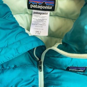 Teal Patagonia girls down jacket.